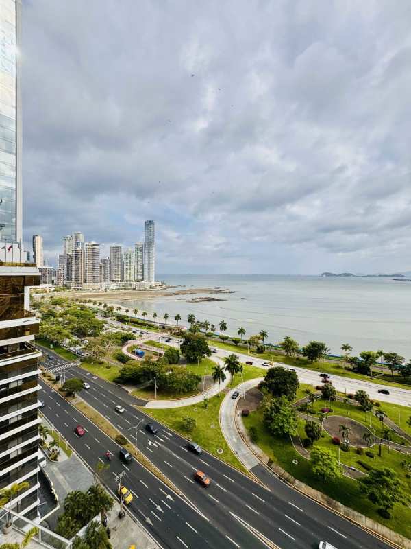Modern luxury bathroom with double sinks and glass shower in Yoo Panama Avenida Balboa