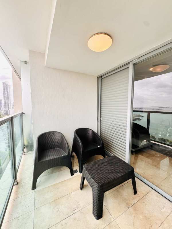 Spacious modern bedroom with skyline view in luxury building Yoo Panama