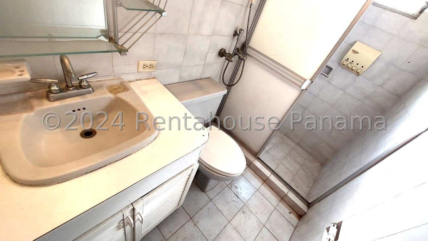 Traditional bathroom with tiled walls vanity and walk-in shower Villa Zaita house Panama