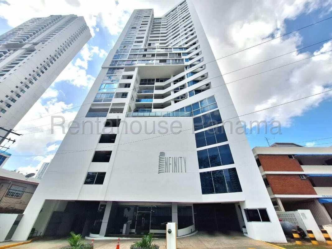 Exterior of PH Infinity Tower, modern high-rise with balconies and glass facade in San Francisco Panama City