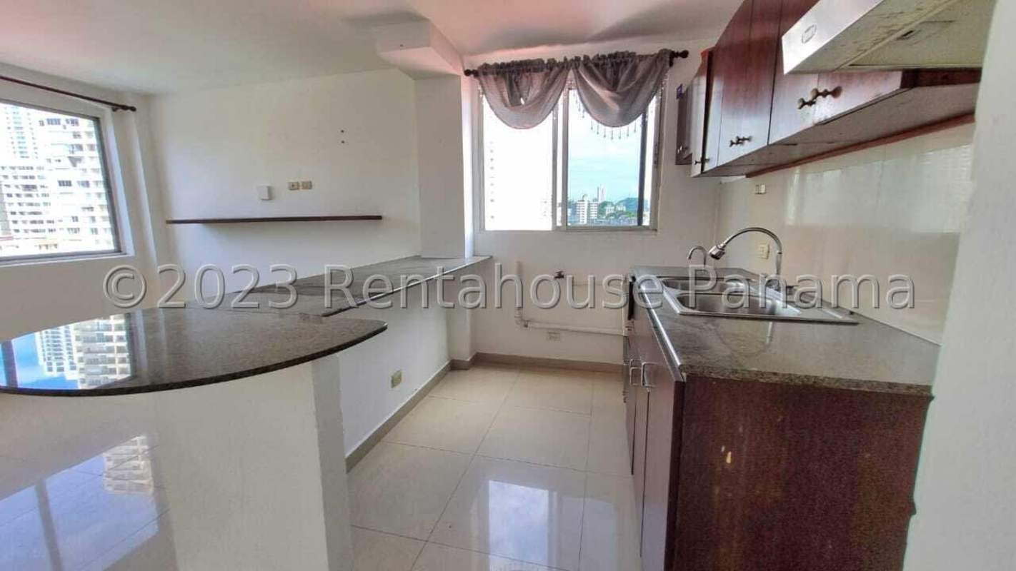 Bedroom with window, closet, and fan in PH Altos del Golf Panama City