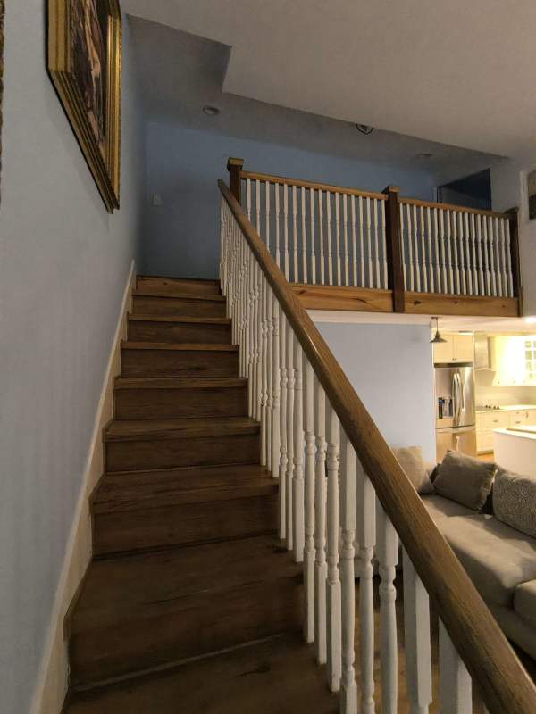 Contemporary bathroom with walk-in shower, tile walls at Amador Causeway apartment Panama