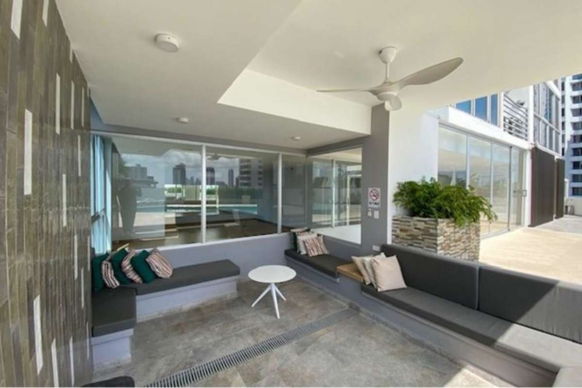 Living and dining room with city view balcony ceramic tile flooring PH Sky Blue Tower Panama