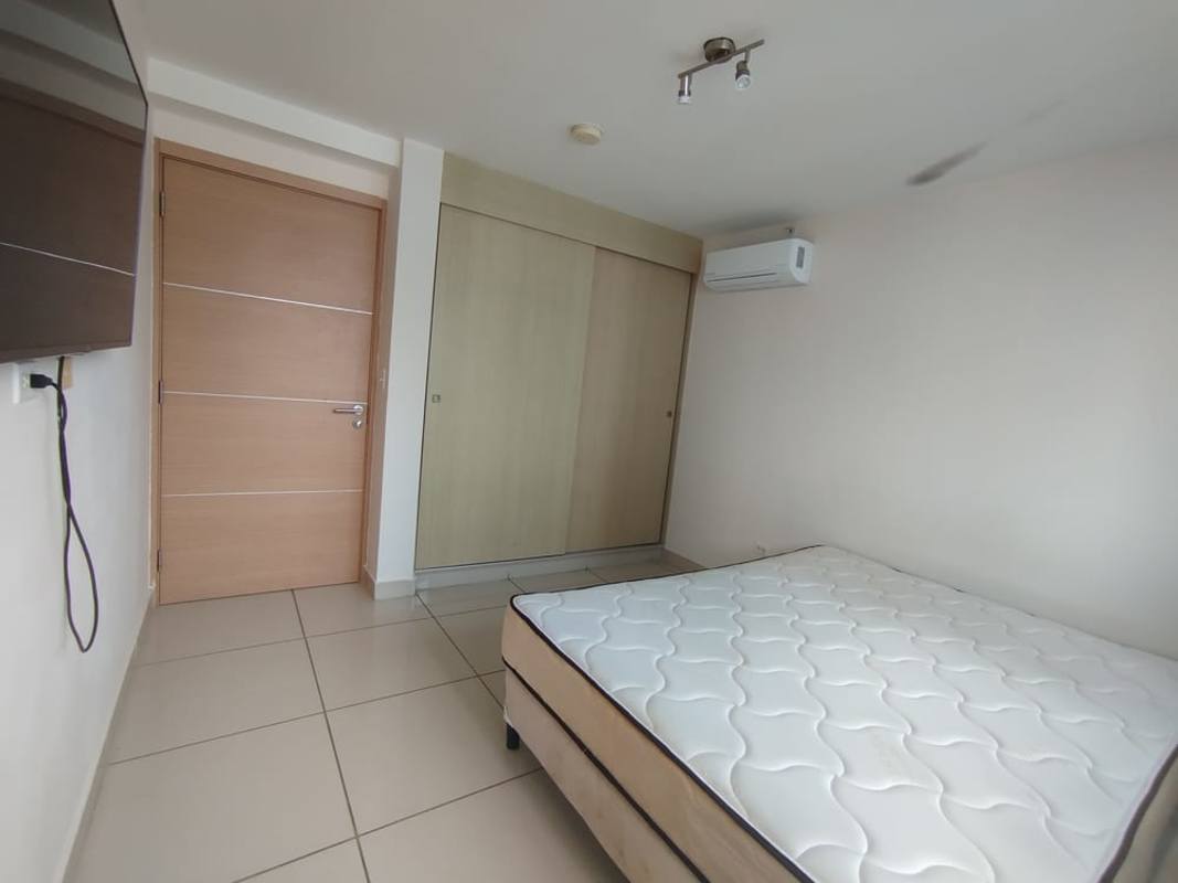 Bedroom city view window AC split tile floors furnished apartment Carrasquilla Panama City