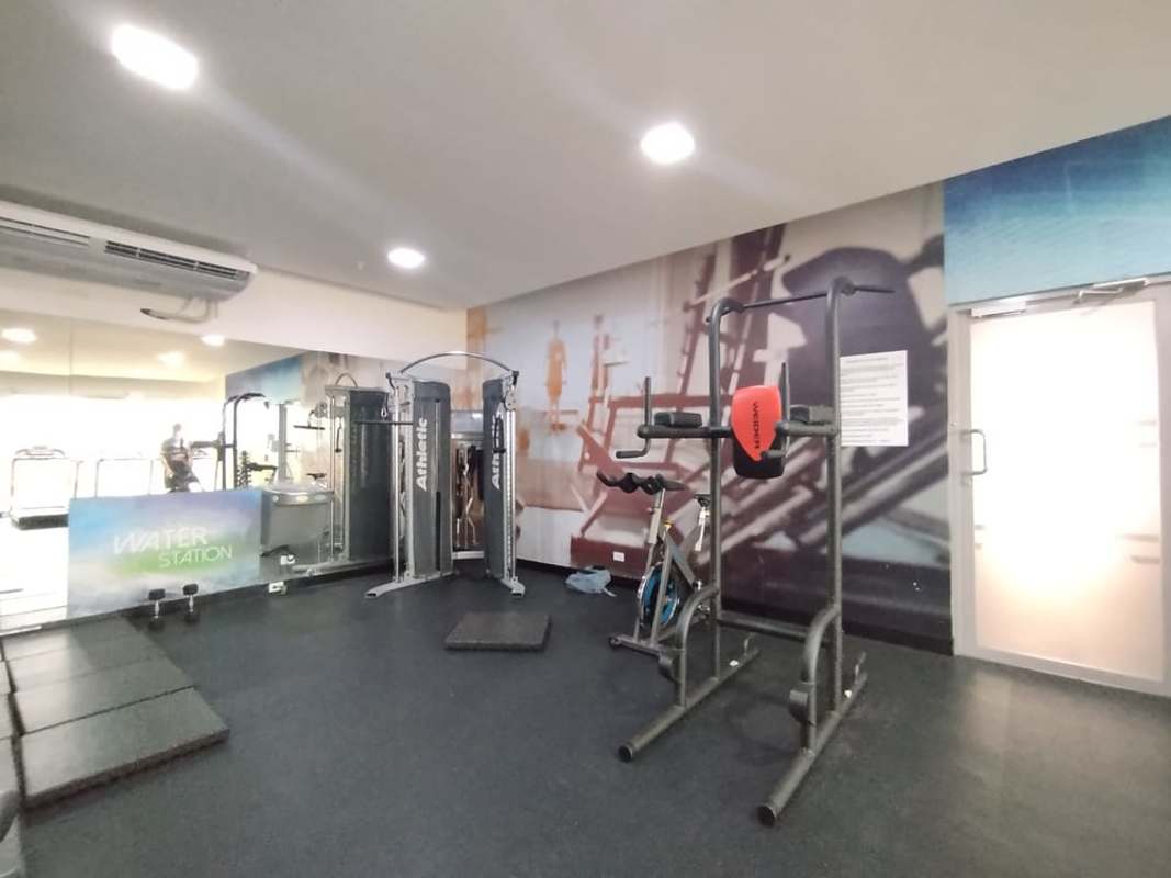 Condo gym with cardio equipment and weights rooftop view in Vista Hermosa Carrasquilla Panama