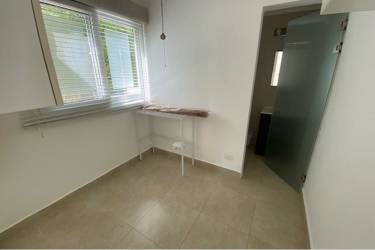 Outdoor private pool with covered terrace and garden in exclusive Cocolí golf house rental Panama