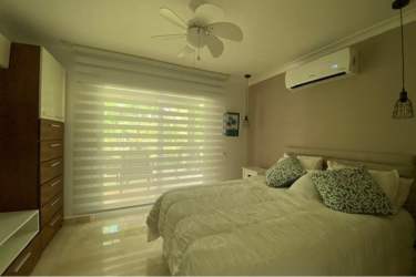 Spacious bathroom with modern fixtures, walk-in shower in luxury golf house rental Panama