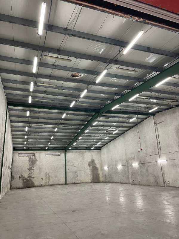 Empty industrial warehouse interior with concrete floors and high ceilings in Tocumen Panama