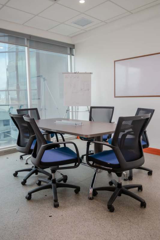 Modern reception with guest seating in PH Atrium Obarrio Panama commercial office