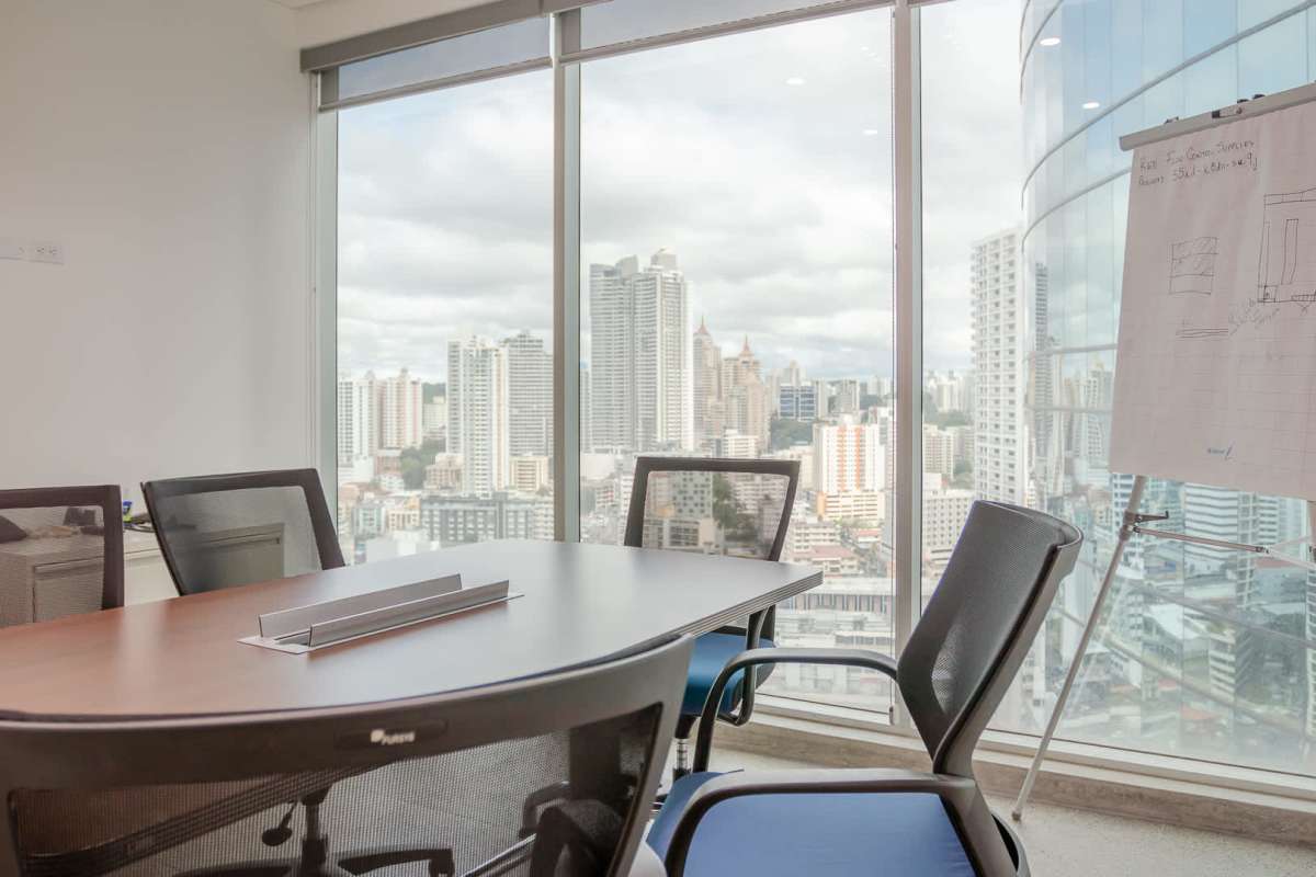 Compact kitchenette with window and storage cabinets PH Atrium Obarrio Panama