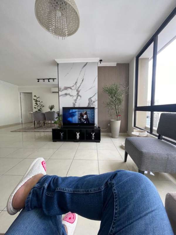 Spacious living room with large windows city skyline view PH Arrecife Punta Paitilla Panama