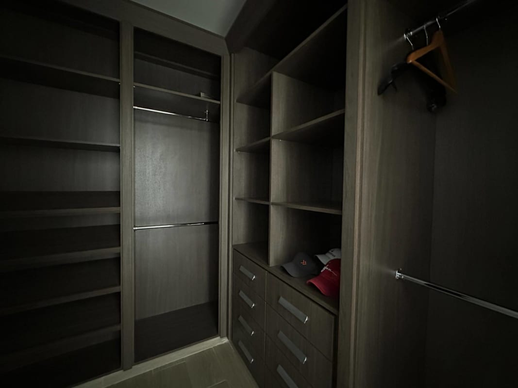 Luxury infinity pool area with sun loungers and skyline views Costa del Este Panama