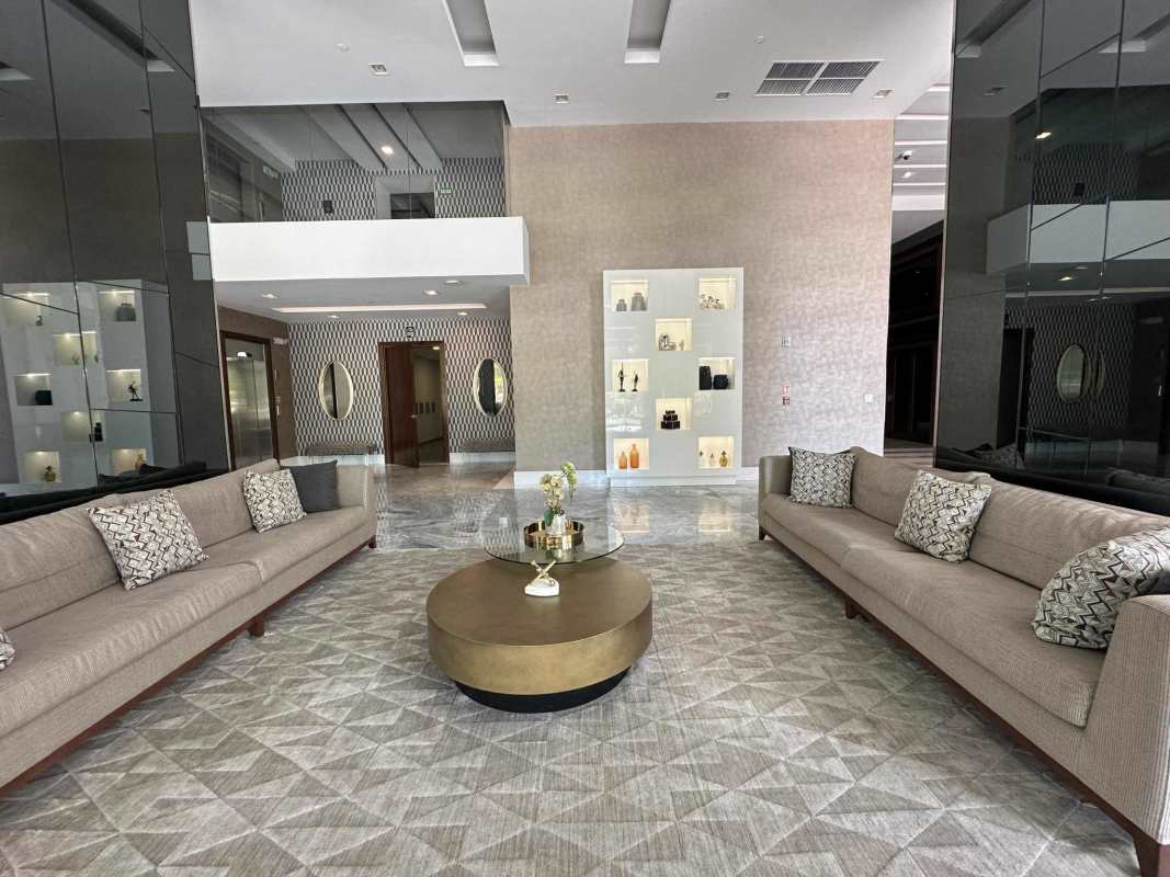 Spacious lobby with contemporary furnishing double height ceilings in Costa del Este tower