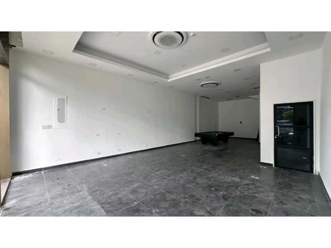 Empty commercial unit recreation space with pool table and modern lighting in Panama City