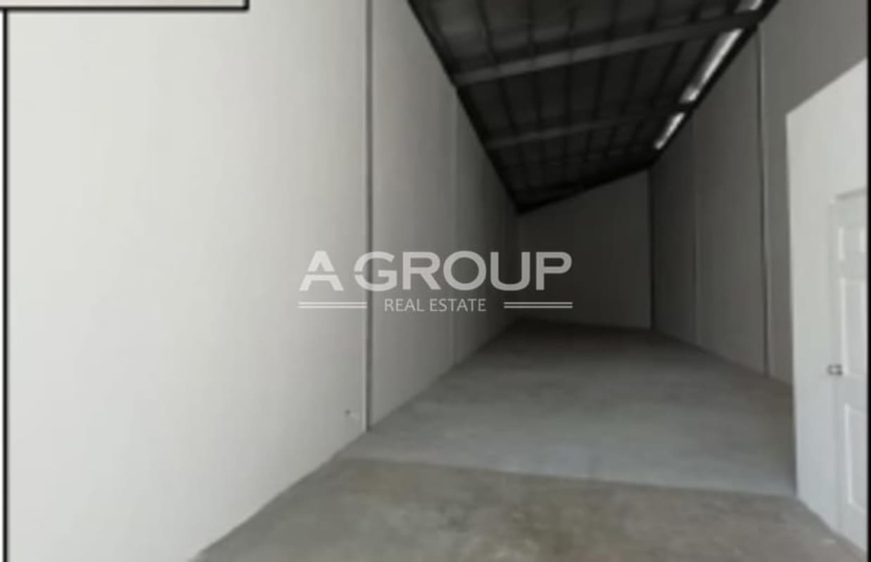 Interior empty industrial warehouse with high ceiling and polished floor at Costa del Este, Panama City