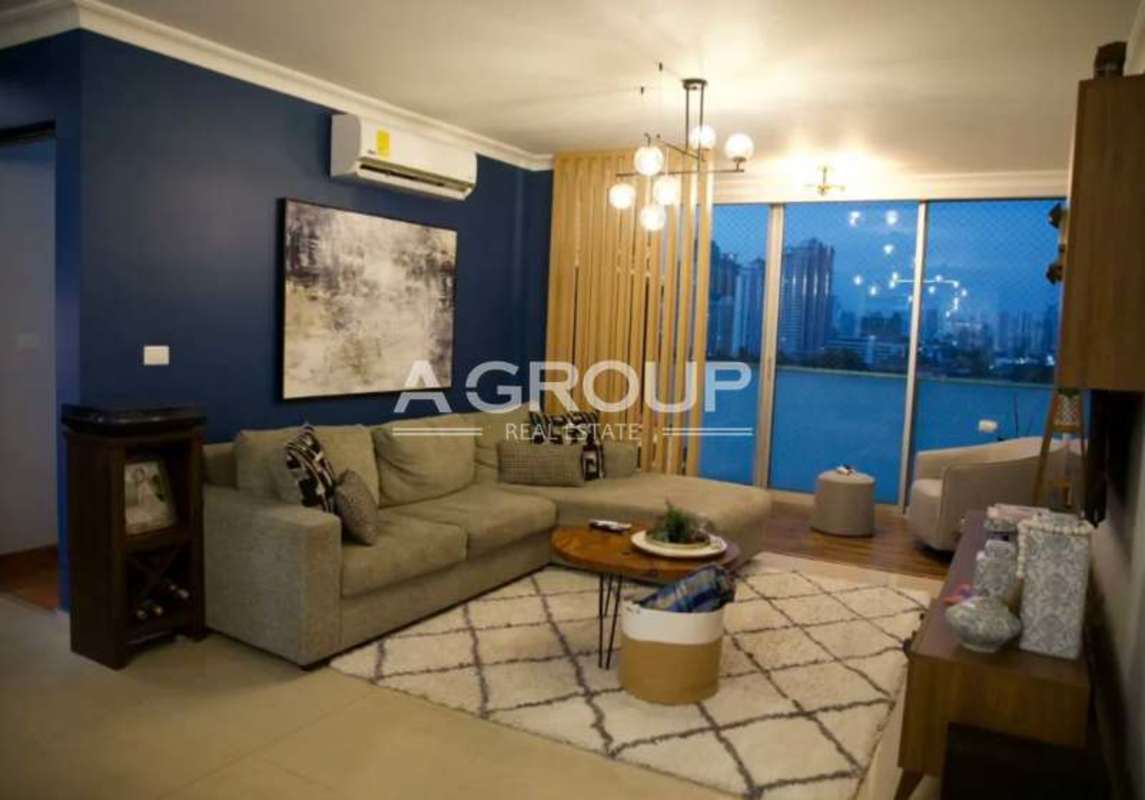 Bedroom with large window, built-in wardrobe, wood floor at PH Pacific Sun Punta Pacifica