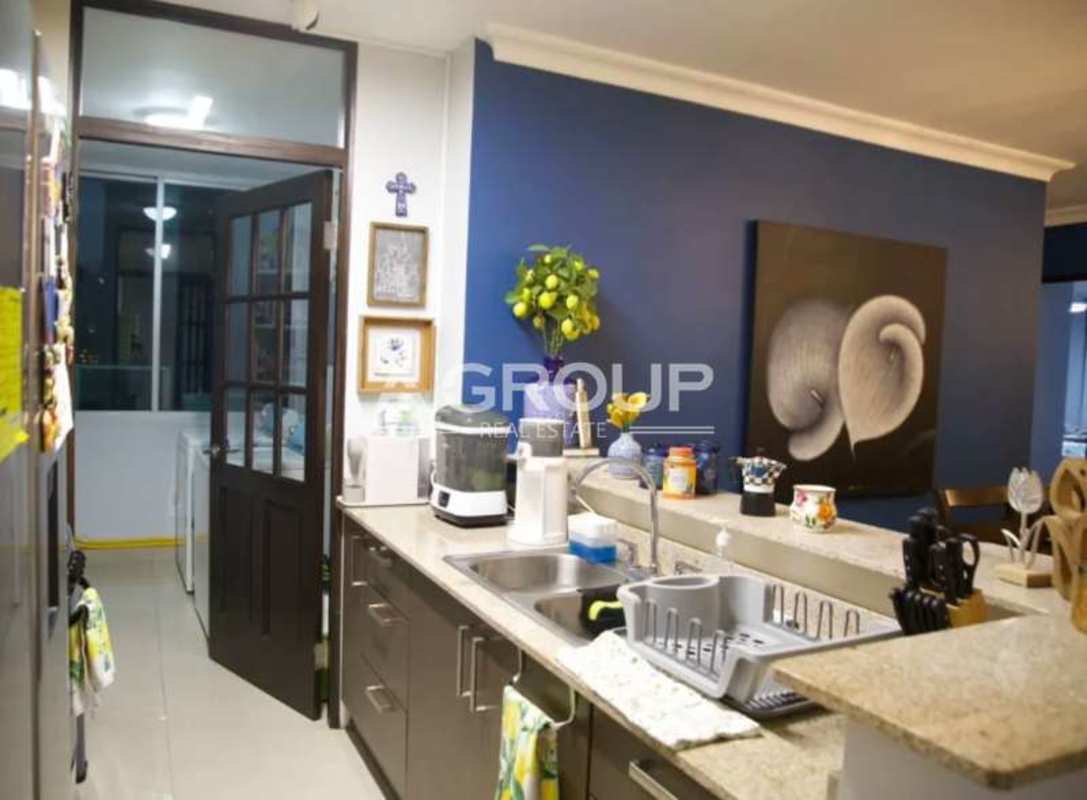 Kitchen with granite countertops and dining space PH Pacific Sun Punta Pacifica Panama
