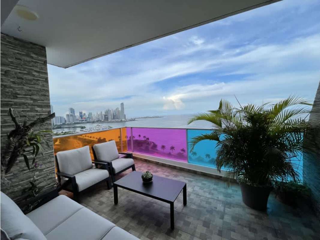 Modern living room with floor-to-ceiling windows and balcony overlooking Pacific Ocean PH Element Panama City