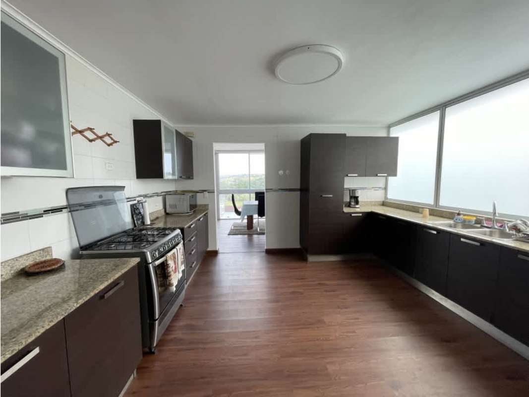 Spacious bedroom with wood floors and city views Clayton PH Pine Hills