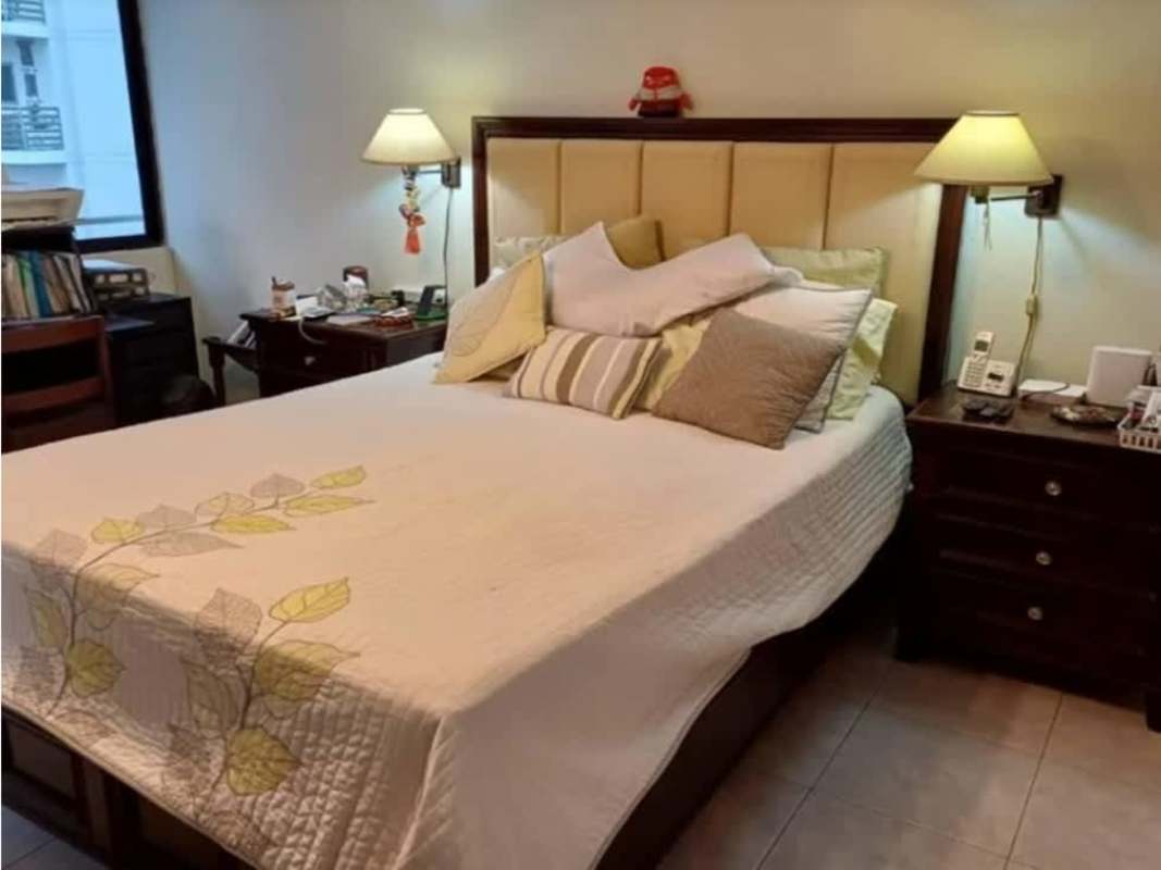 Main bedroom with walk-in closet, large window, neutral tones in PH Royal Princess Punta Paitilla Panama