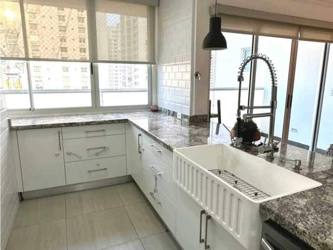 Granite countertop and farmhouse sink in modern kitchen PH Moon Tower Panama