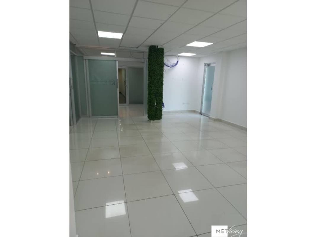 Modern empty office with glass partitions and drop ceiling at El Cangrejo Plaza Panama