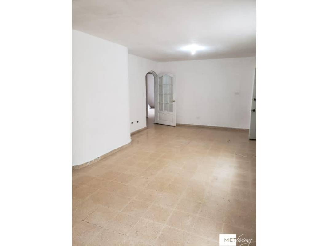 Exterior view with black metal gate, driveway, plants Villa Lucre Panama City