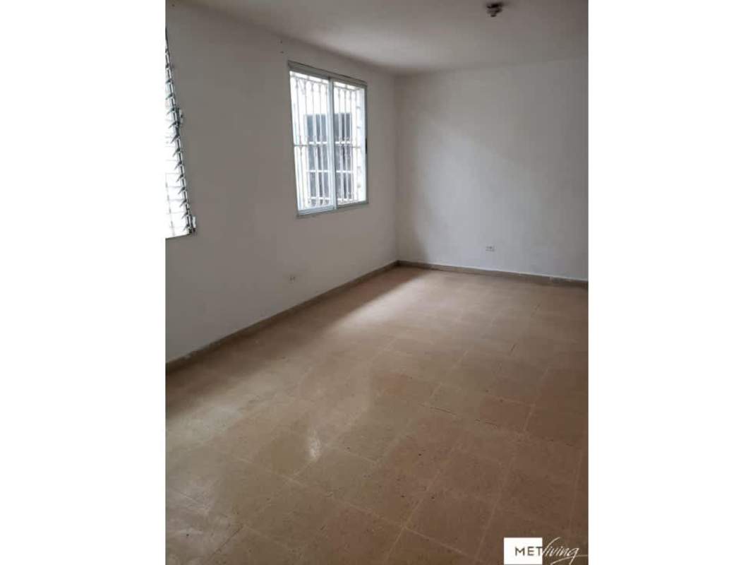 Large built-in wooden closet with louvered doors Villa Lucre house Panama City