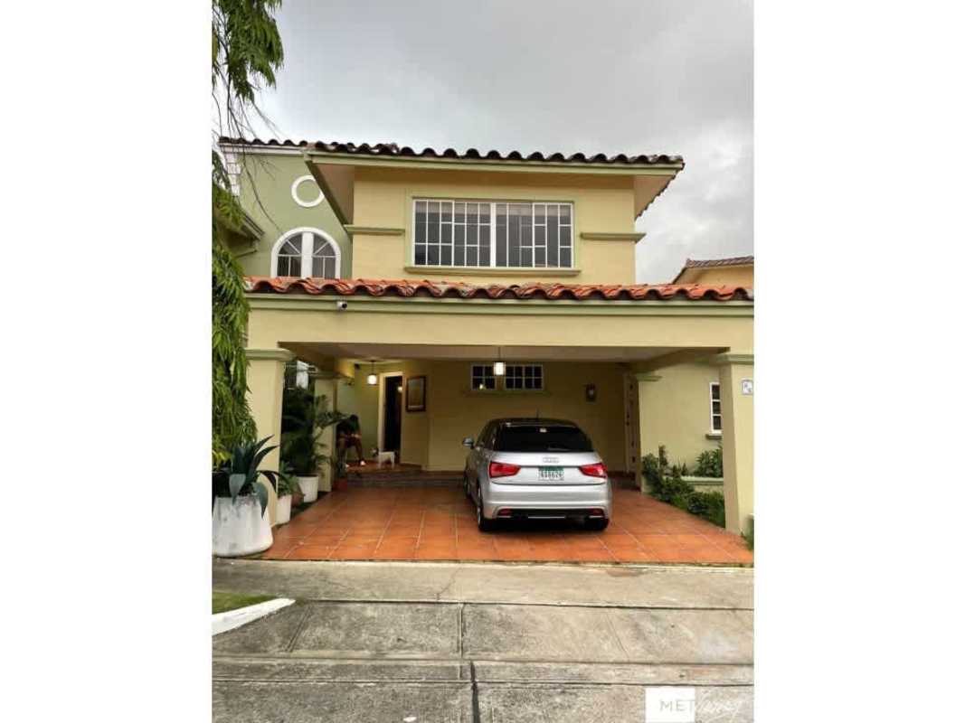 Two-story Mediterranean style house with tiled roof in gated Crystal Springs Residences Pedregal Panama