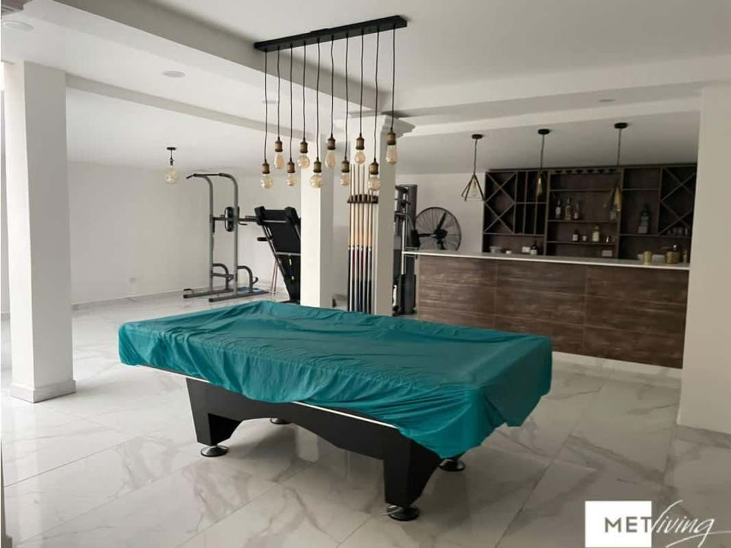 Modern game room with pool table, bar, gym at Crystal Springs Pedregal Panama City