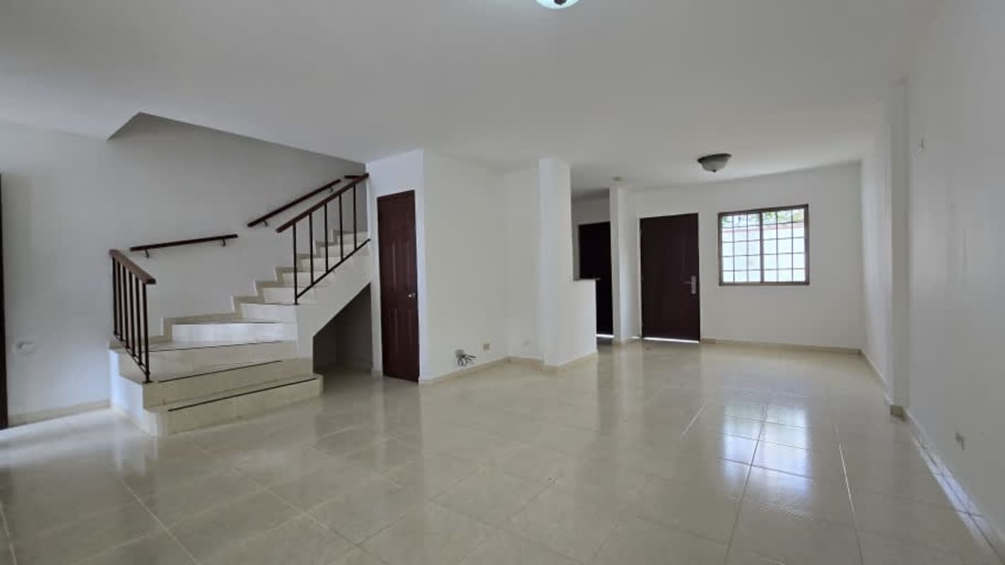 Contemporary bathroom with glass shower, granite vanity top and mirror in Panama house