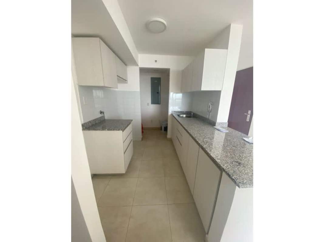 Open kitchen area with granite countertop in PH Alegría Bella Vista Panama apartment