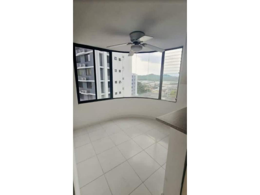 Bright bedroom with large window and tiled flooring in PH Terrazas del Cangrejo Panama