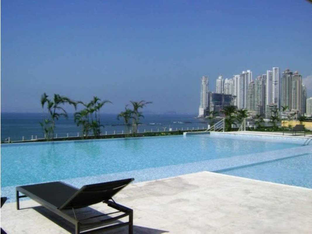 Infinity swimming pool with Panama City skyline and Pacific Ocean views at PH Terrawind Coco del Mar