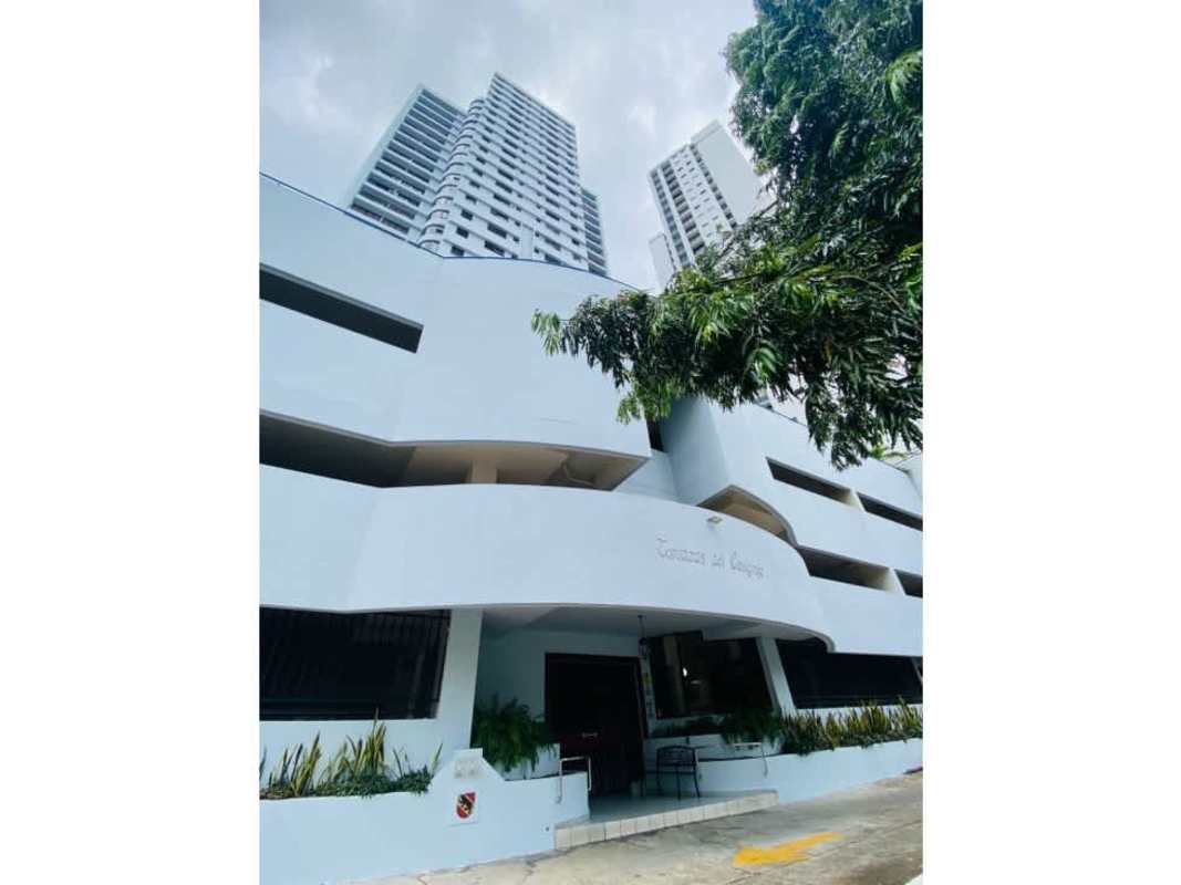 Contemporary dining area with large windows and stylish chandelier at Terrazas del Cangrejo Panama