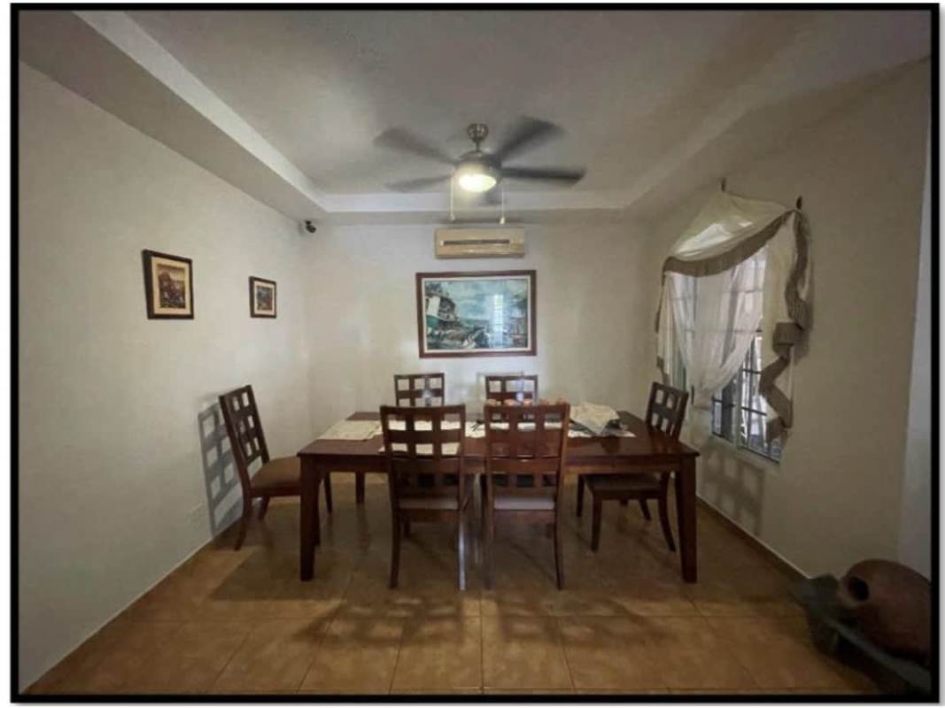 Dedicated laundry area with washer, dryer, and overhead cabinets Villa Zaita