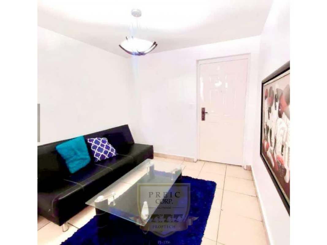 Bedroom with bed, closet, air conditioning and ceiling fan in furnished apartment PH Brisas de España Panama
