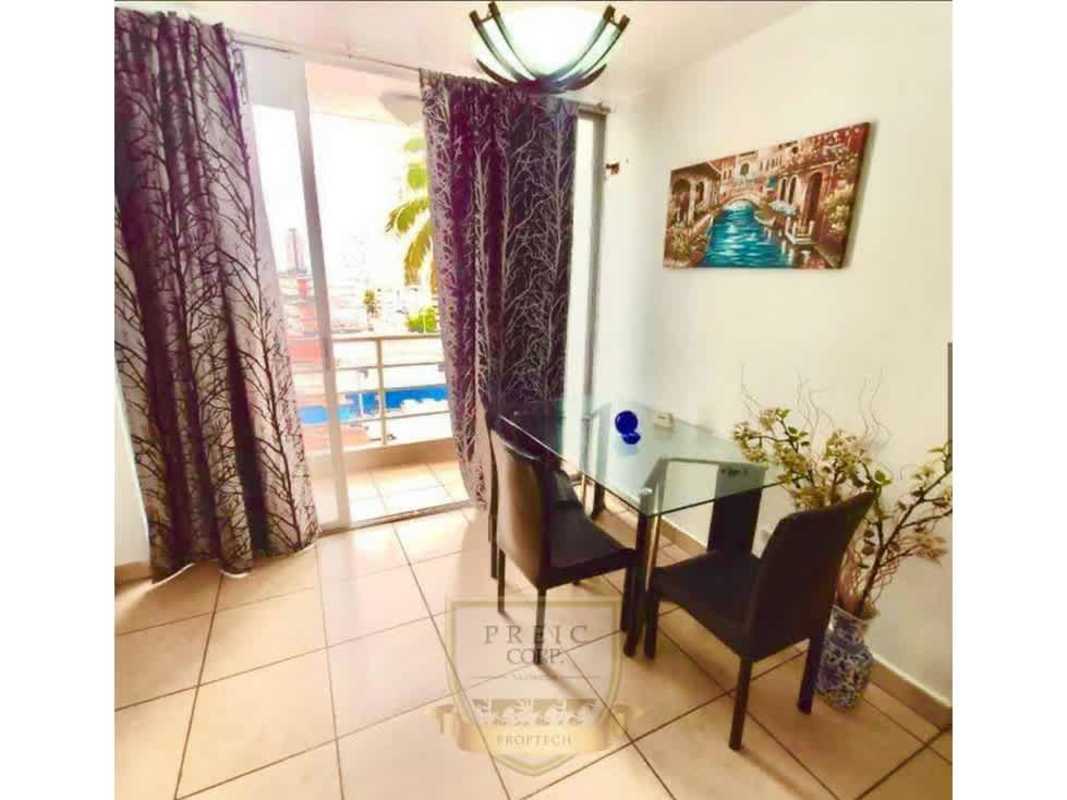 Modern bathroom with glass shower door, beige tiles in furnished apartment PH Brisas de España Carrasquilla