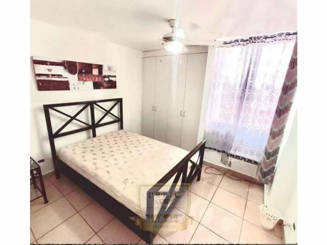 Bedroom with AC, ceiling fan, built-in closet, and window in PH Brisas de España