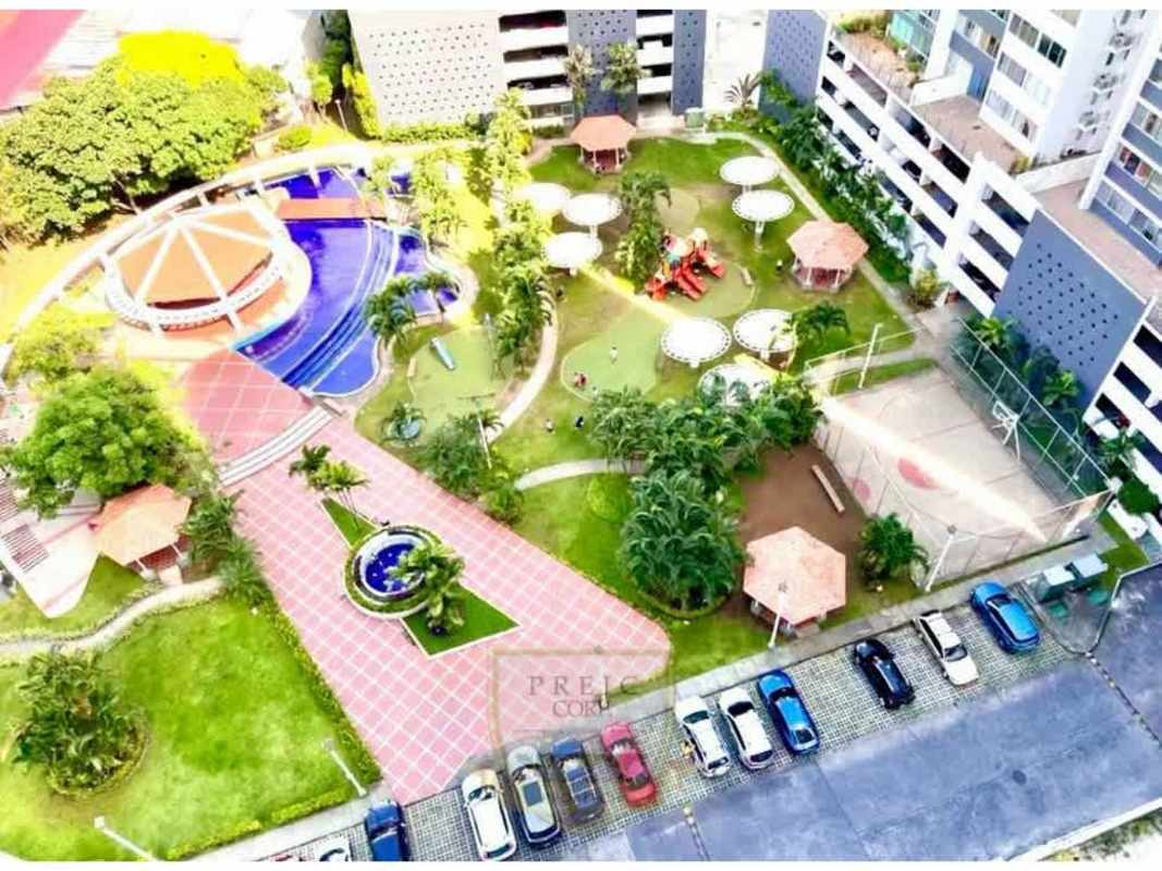 Bright living room with large glass doors to balcony panoramic city view rental Central Park Towers Panama