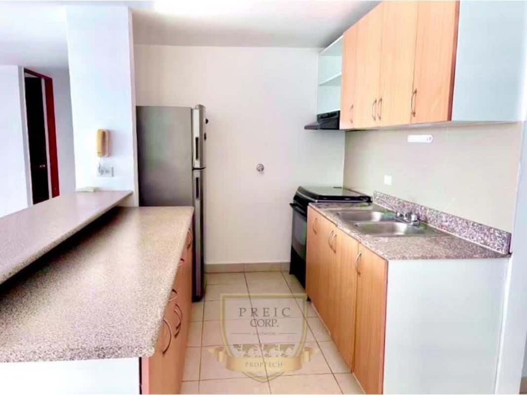 Contemporary kitchen with wooden cabinets granite counters appliances Central Park Panama City