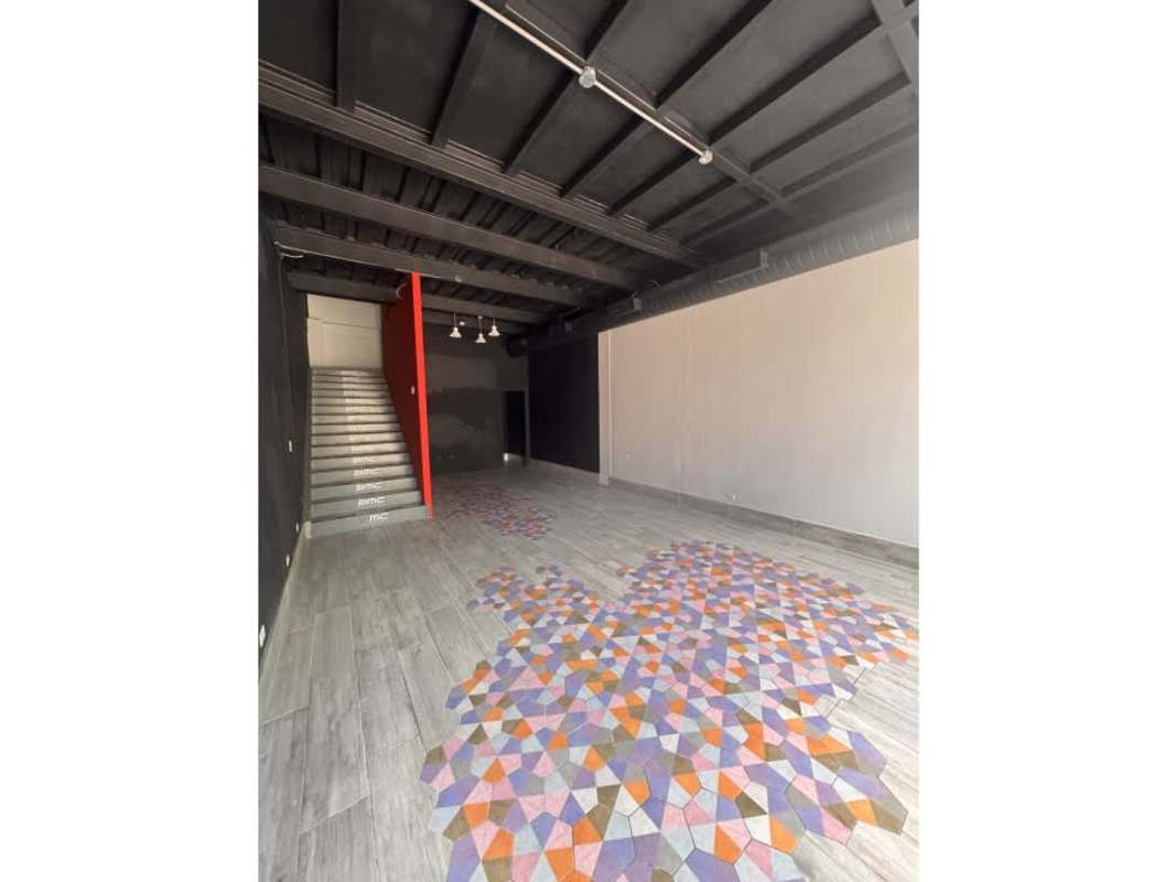 Industrial commercial retail unit with decorative flooring and stair access in Plaza San Francisco Panama