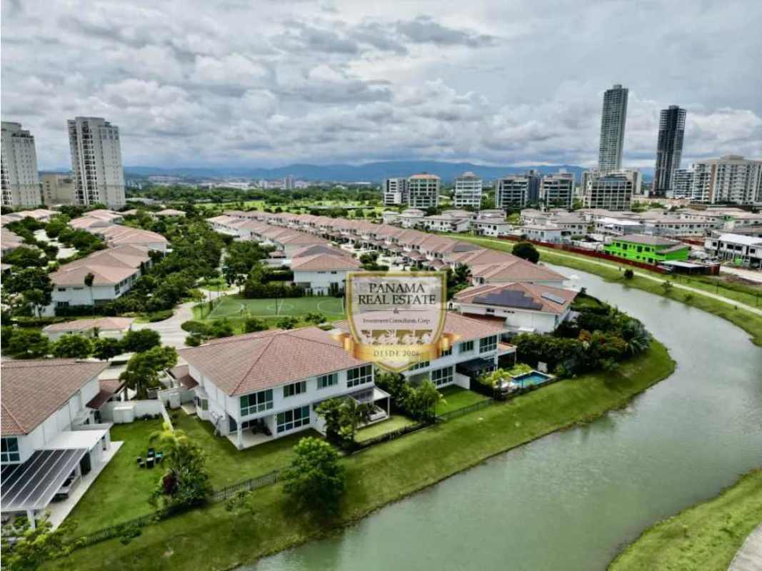 Spacious master bedroom with lake views at The Grove Santa María Panama