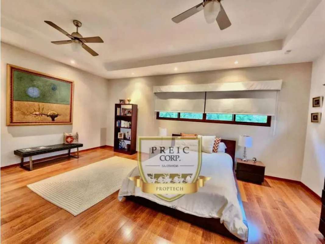 Grand staircase foyer with marble and wood detail luxury house Balmoral Costa del Este Panama