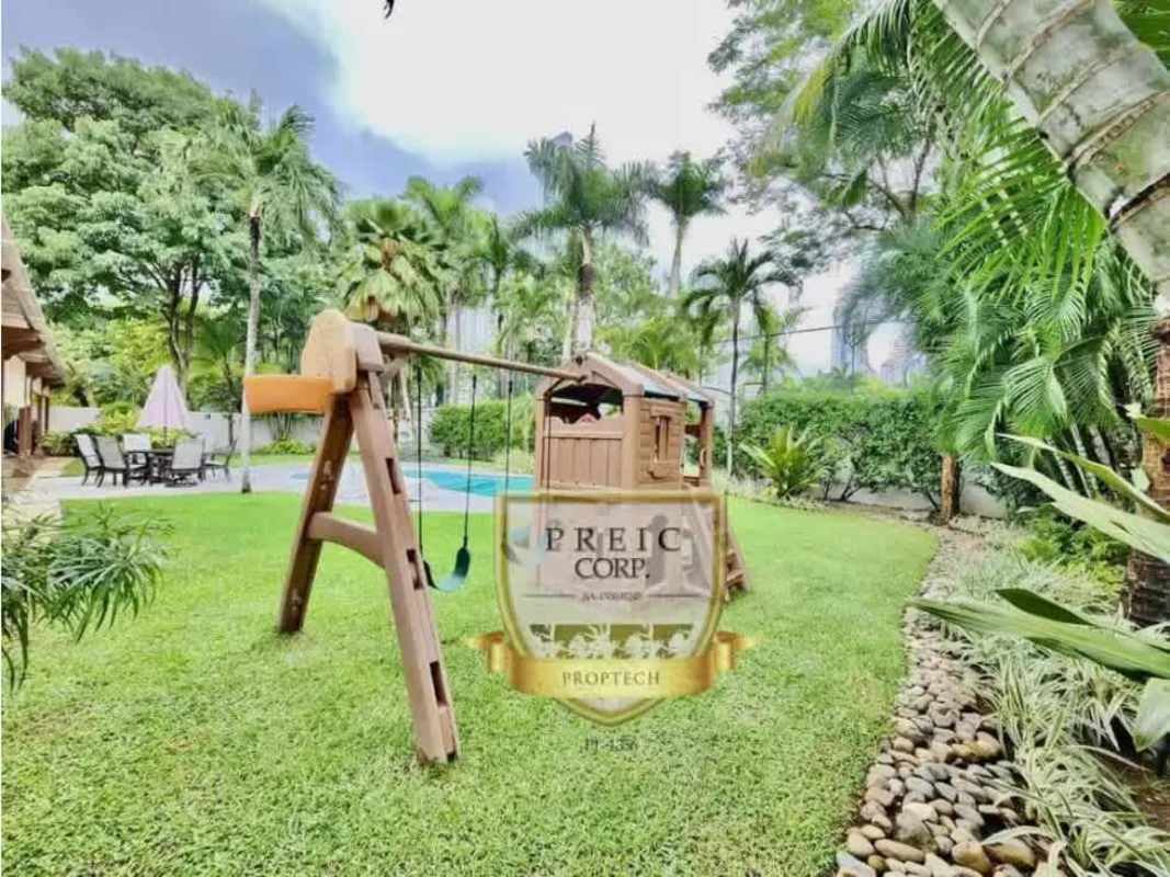 Contemporary kitchen with granite island and stainless appliances Costa del Este luxury villa Panama