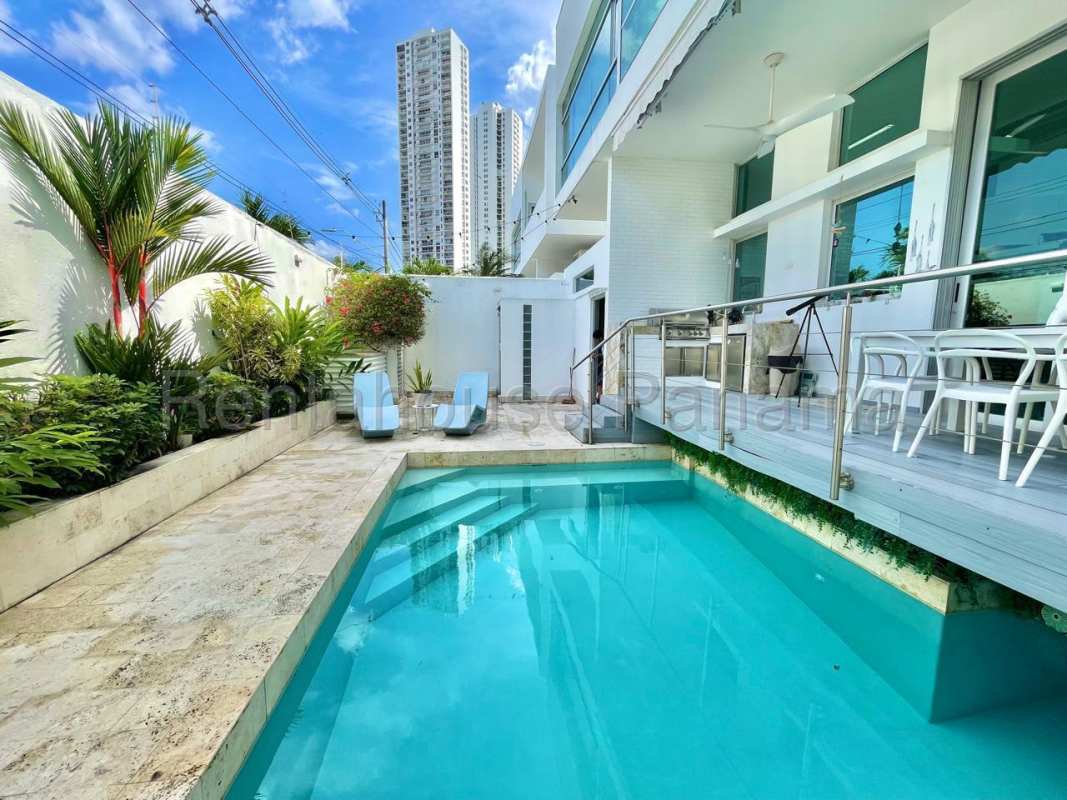 Modern gourmet kitchen with granite countertops stainless appliances in Altos del Golf Panama rental house