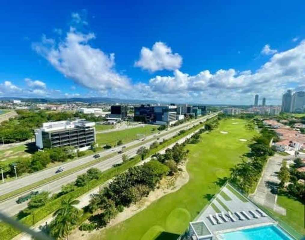 Drone view of Santa Maria Golf Club, PH Greenview pool, gardens and skyline Panama City