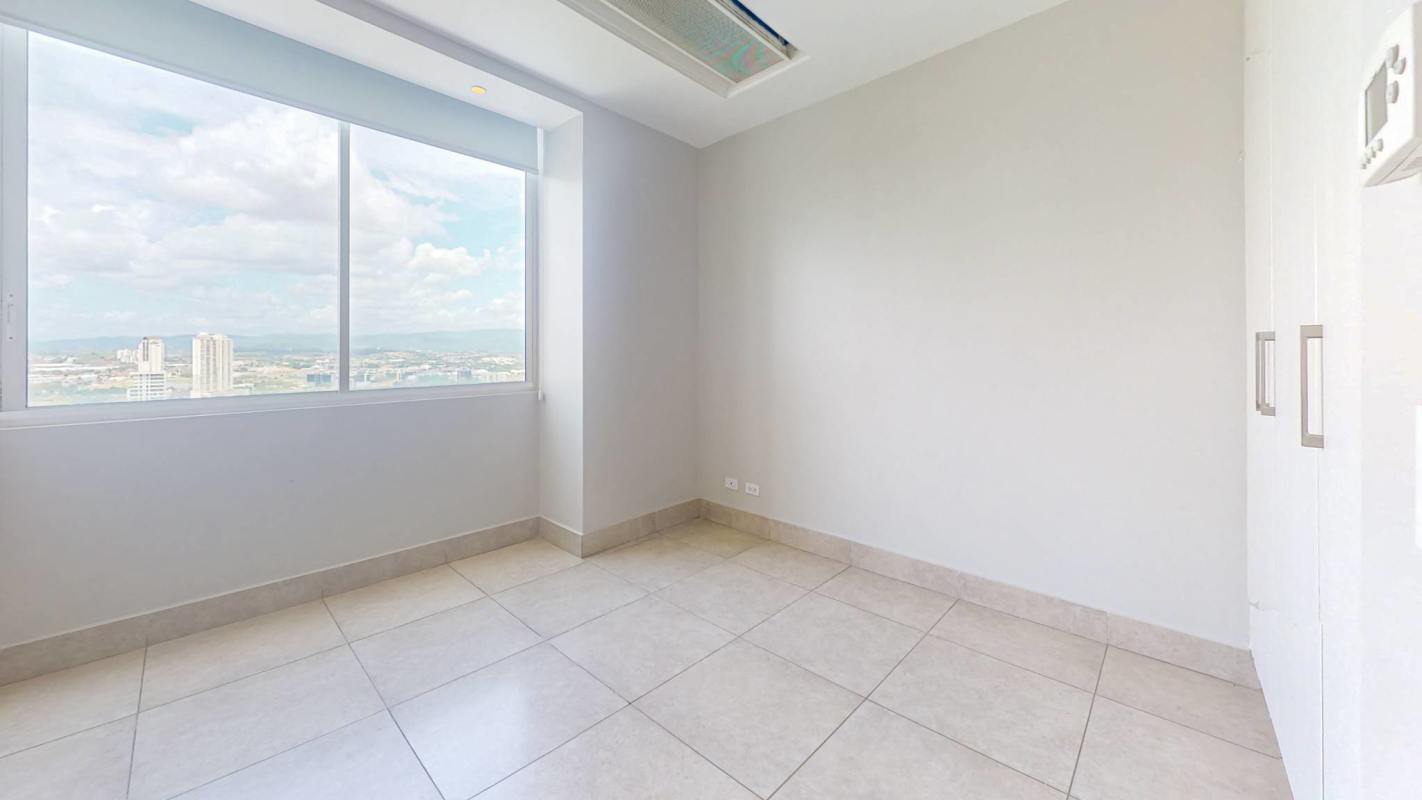 Modern oceanfront balcony with panoramic Pacific views in luxury penthouse at Costa del Este Panama