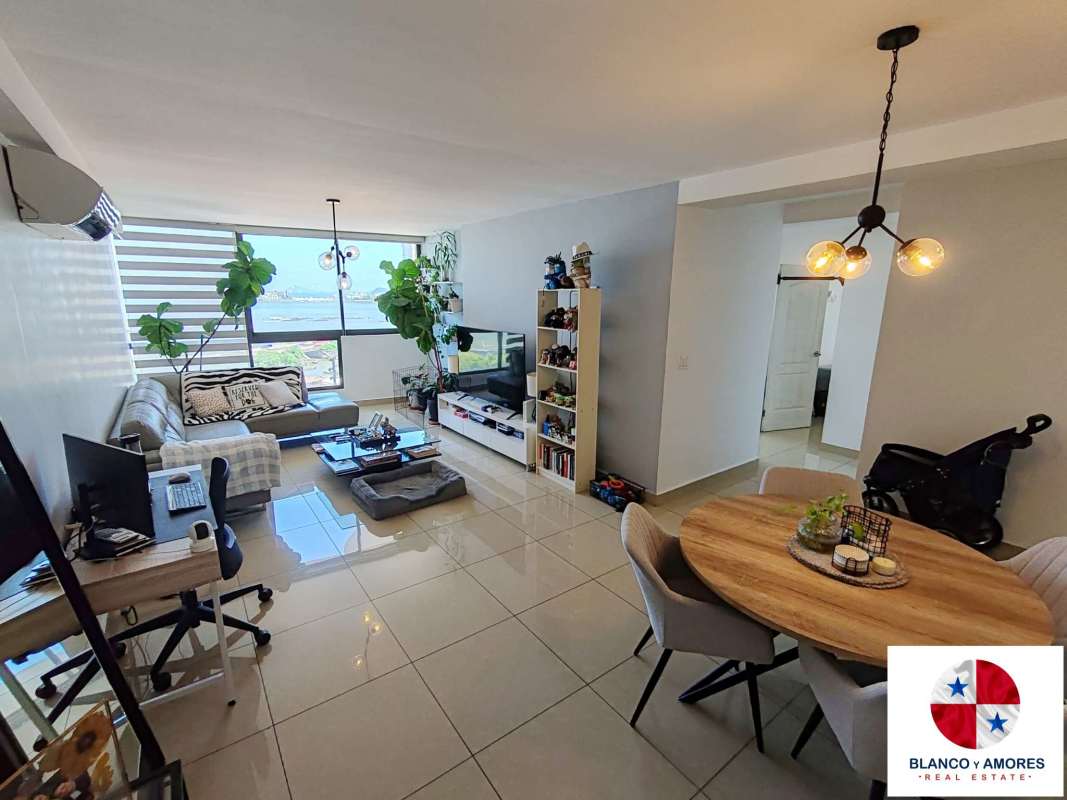 Contemporary dining space with large windows and ocean view in PH San Francisco Bay Panama