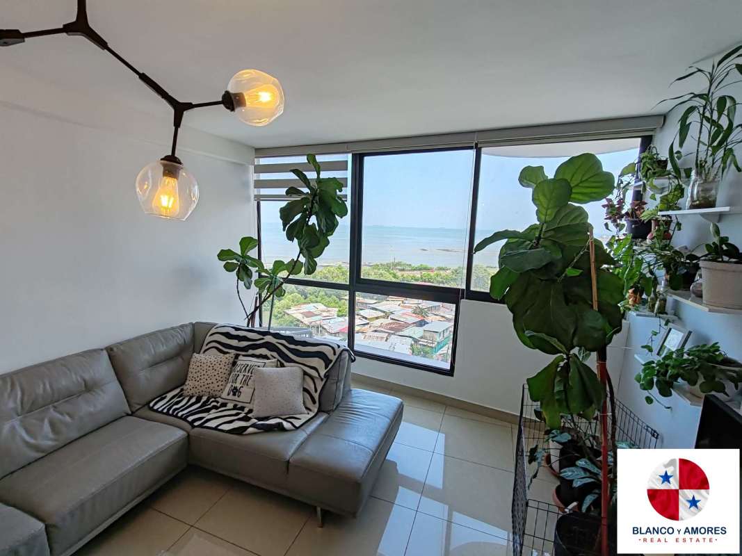 Modern kitchen with appliances, marble backsplash, white cabinets PH San Francisco Bay Panama